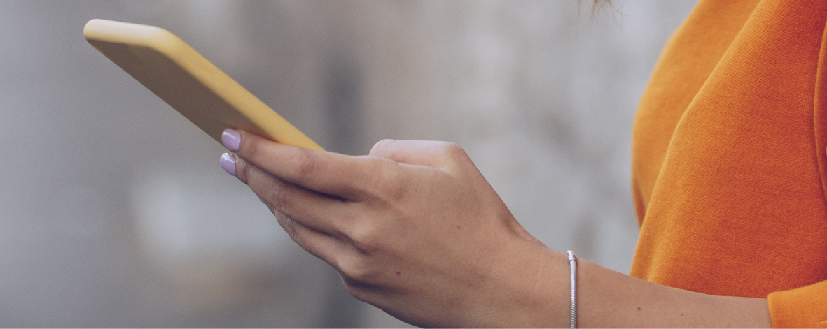 lady looking at cell phone